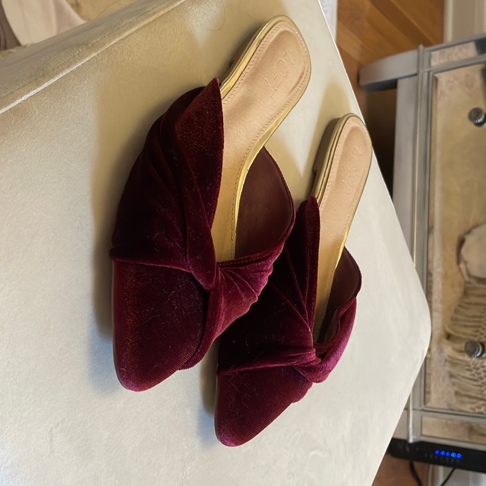 Loft mules worn no more than a handful of times, bottoms are scuffed.